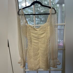 Mini scrunch dress with sheer sleeves